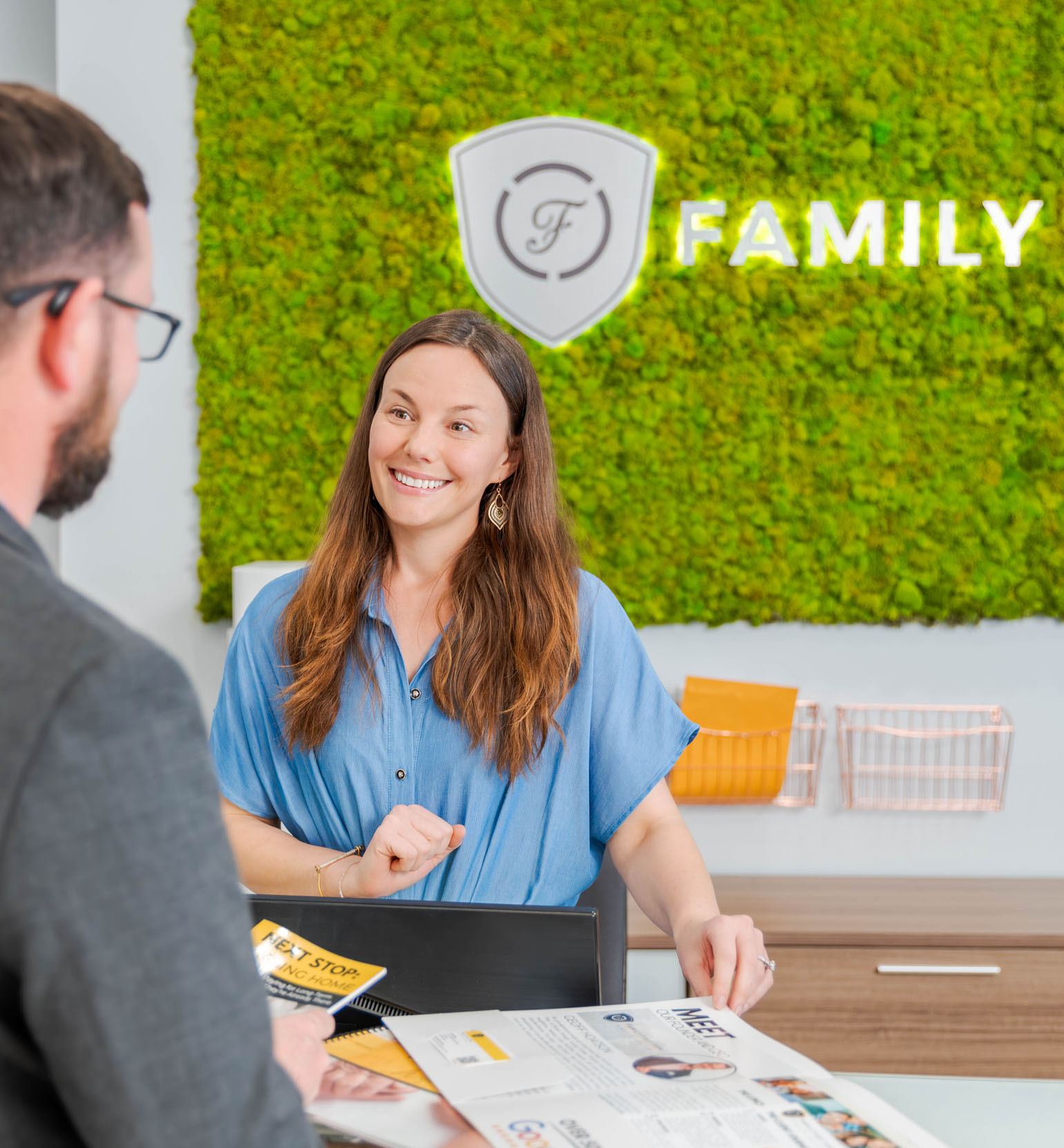a receptionist attending a client
