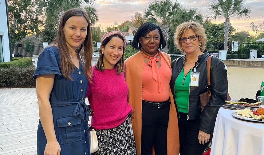 Team members together for a photograph